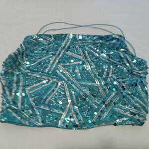 Beautiful turquoise sequined top with open back and small elastic straps